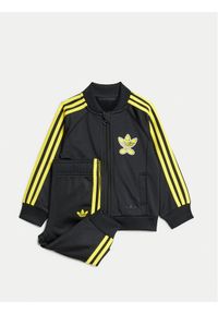 Adidas - adidas Dres Smiley World SST JD2874 Czarny Regular Fit. Kolor: czarny. Materiał: syntetyk #1