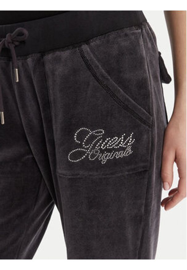 Guess Spodnie dresowe W6RB32 KCUF1 Granatowy Regular Fit. Kolor: niebieski. Materiał: bawełna