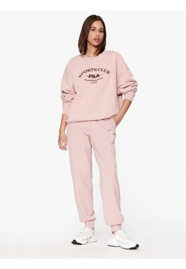 Fila Spodnie dresowe FAW0559 Różowy Relaxed Fit. Kolor: różowy. Materiał: dresówka, bawełna