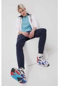 Tommy Jeans Spodnie męskie kolor granatowy joggery. Kolor: niebieski. Materiał: bawełna