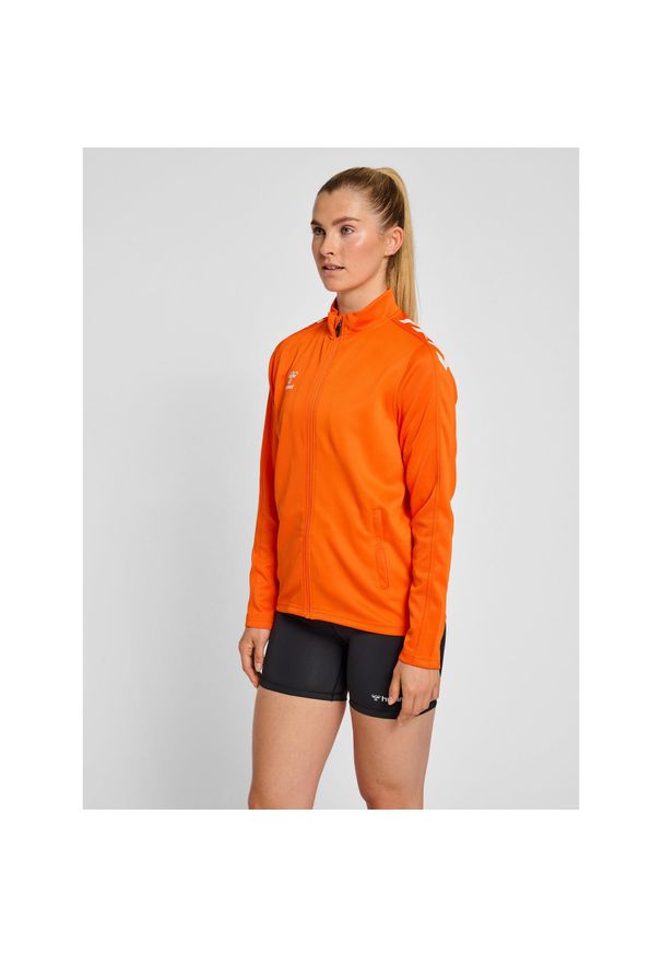 Bluza sportowa damska Hummel half zip Core XK. Kolor: pomarańczowy, żółty, wielokolorowy. Materiał: dresówka