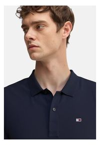 Tommy Jeans Polo Flag Cuff DM0DM21306 Granatowy Slim Fit. Typ kołnierza: polo. Kolor: niebieski. Materiał: bawełna
