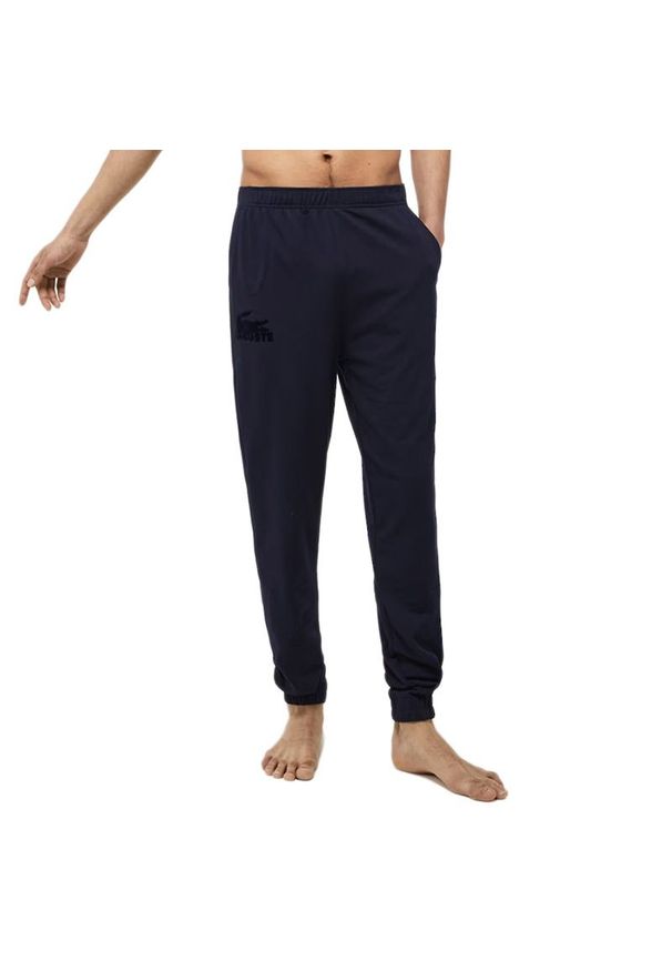 Spodnie Lacoste Loungewear Shell 3H5422-423 - granatowe. Kolor: niebieski. Materiał: dresówka, bawełna, poliester, materiał, elastan