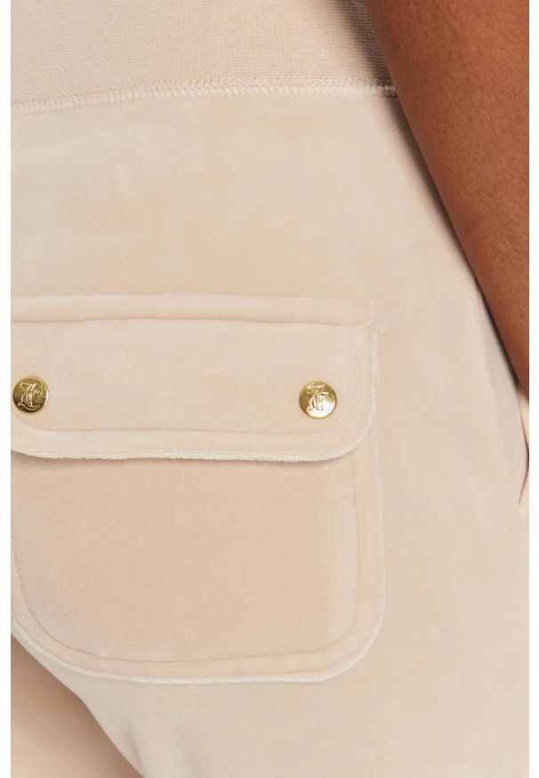 Juicy Couture - JUICY COUTURE Piaskowe damskie spodnie dresowe Del Ray Gold, Rozmiar S. Kolor: beżowy. Materiał: dresówka