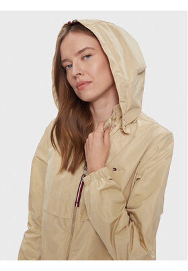 TOMMY HILFIGER - Tommy Hilfiger Wiatrówka Transitional WW0WW41790 Beżowy Regular Fit. Kolor: beżowy. Materiał: syntetyk