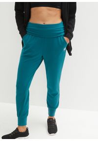 bonprix - Bardzo miękkie spodnie haremki z domieszką modalu. Kolor: niebieski. Wzór: prążki #1