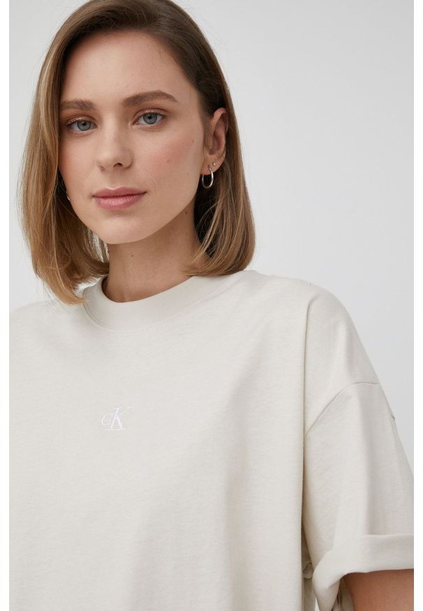 Calvin Klein Jeans t-shirt bawełniany kolor beżowy. Kolor: beżowy. Materiał: bawełna. Wzór: aplikacja