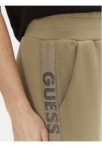 Guess Spodnie dresowe W5RB00 KBYE2 Zielony Regular Fit. Kolor: zielony. Materiał: syntetyk #5