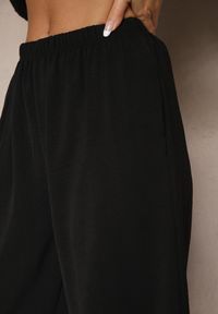 Renee - Czarne Luźne Spodnie 3/4 z Kieszonkami Efrinea. Okazja: na co dzień. Kolor: czarny. Materiał: guma. Styl: casual, elegancki #5