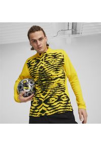 Puma - Męska bluza przedmeczowa z zamkiem 1/4 Borussia Dortmund PUMA. Kolor: czarny, wielokolorowy, żółty. Sport: piłka nożna