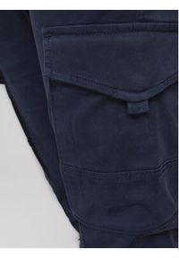 Jack & Jones - Jack&Jones Spodnie materiałowe Paul 12169582 Granatowy Tapered Fit. Kolor: niebieski. Materiał: bawełna