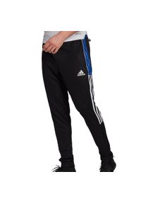 Adidas - Spodnie adidas Tiro 21 Track M GJ9866. Kolor: czarny, wielokolorowy, niebieski