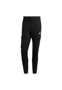 Adidas - Kombinezon do biegania z polaru Tapered adidas Essentials. Kolor: biały, wielokolorowy, czarny. Materiał: polar, bawełna, poliester. Sport: joga i pilates, fitness