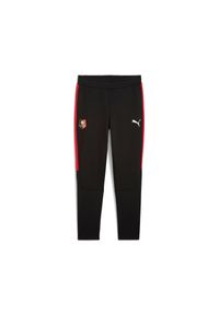 Puma - Spodnie dresowe Stade Rennais Evostripe. Kolor: czarny. Materiał: dresówka. Sport: piłka nożna