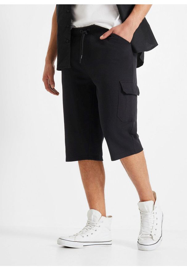 bonprix - Długie dresowe bermudy bojówki z czystej bawełny, regular fit. Kolor: czarny. Materiał: dresówka, bawełna. Długość: długie