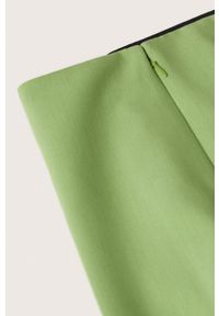 mango - Mango spodnie Atenas damskie kolor zielony szerokie high waist. Stan: podwyższony. Kolor: zielony