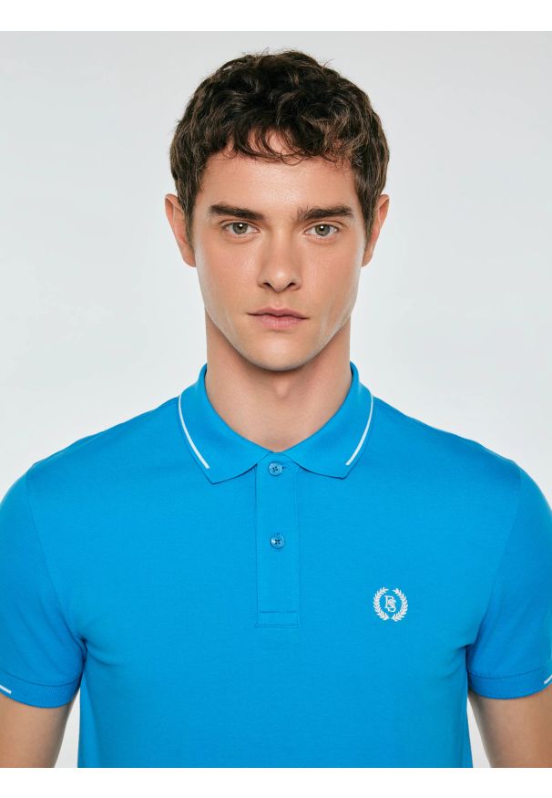 Big-Star - Koszulka męska polo niebieska Polian 401. Typ kołnierza: polo. Kolor: niebieski. Materiał: bawełna, dzianina. Wzór: ze splotem, paski, haft. Styl: sportowy