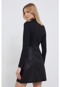 Calvin Klein Jeans Sukienka kolor czarny mini rozkloszowana. Kolor: czarny. Materiał: włókno. Długość rękawa: długi rękaw. Typ sukienki: rozkloszowane. Długość: mini #4