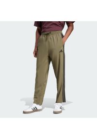 Adidas - Spodnie Essentials 3-Stripes Stanford Open Hem. Kolor: beżowy, wielokolorowy, czarny. Materiał: materiał. Sport: fitness #1