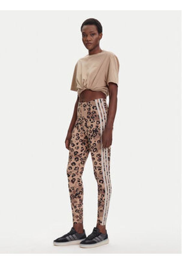 Adidas - adidas Legginsy Animal Print 3-Stripes JM1865 Beżowy Slim Fit. Kolor: beżowy. Materiał: bawełna. Wzór: nadruk