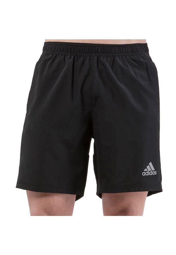 Adidas - adidas Own The Run Shorts > FS9807. Materiał: materiał, poliester, dzianina. Długość: długie. Sport: bieganie