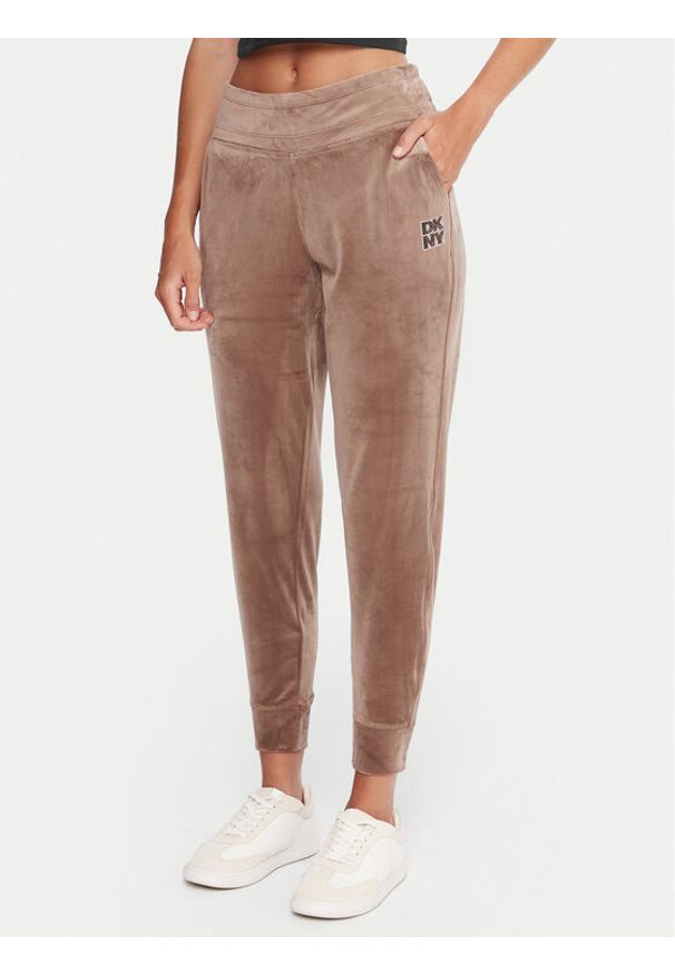 DKNY Sport Spodnie dresowe DP5P3710 Beżowy Regular Fit. Kolor: beżowy. Materiał: syntetyk