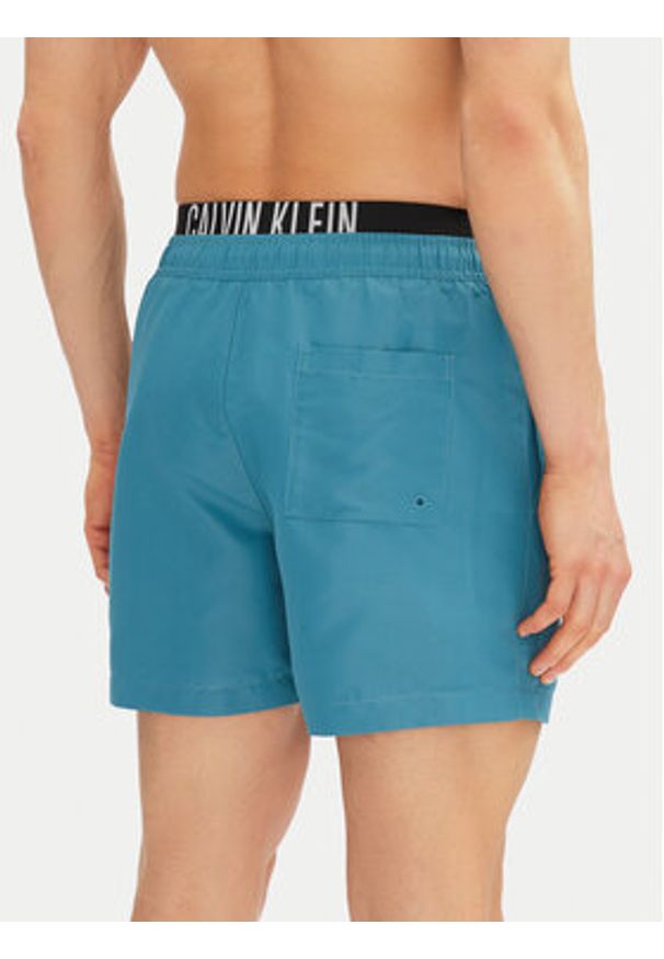 Calvin Klein Swimwear Szorty kąpielowe KM0KM01093 Niebieski Regular Fit. Kolor: niebieski. Materiał: syntetyk