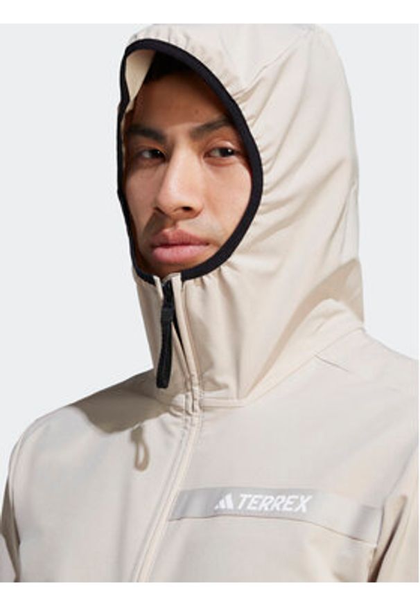 Adidas - adidas Kurtka outdoor Terrex Multi HZ4423 Beżowy Slim Fit. Kolor: beżowy. Materiał: syntetyk. Sport: outdoor