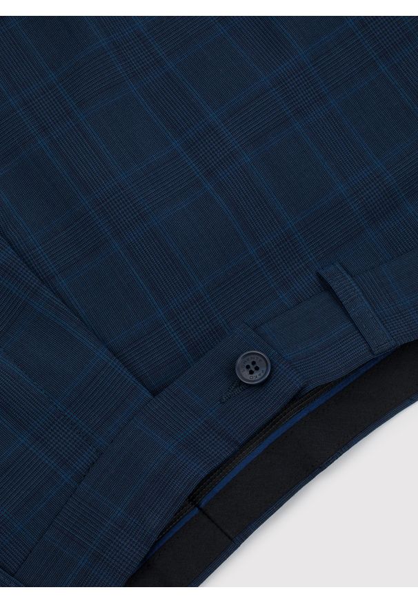 Pako Lorente - PAKO LORENTE – Granatowe spodnie garniturowe w delikatną niebieską kratkę. Kolor: niebieski. Materiał: wełna, poliester, lycra. Wzór: kratka