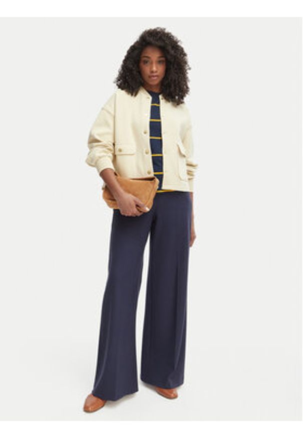 TOMMY HILFIGER - Tommy Hilfiger Kurtka przejściowa WW0WW48730 Beżowy jasny Relaxed Fit. Kolor: beżowy. Materiał: bawełna