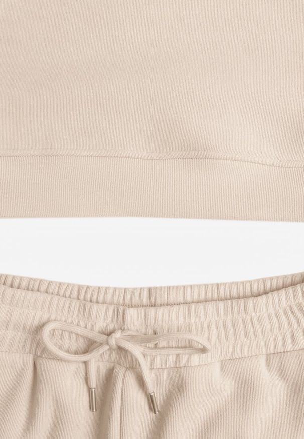 Renee - Beżowy 2-częściowy Komplet Dresowy z Bluzą i Spodniami Orifira. Kolor: beżowy. Materiał: dresówka. Wzór: geometria