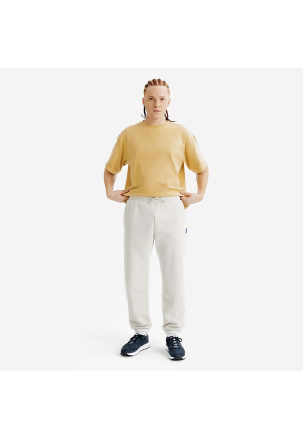 Decathlon - Spodnie męskie Elementals. Kolor: beżowy. Materiał: poliester, bawełna, materiał