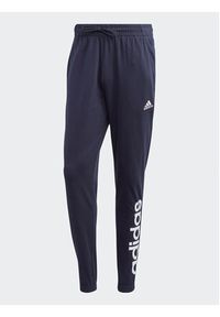 Adidas - adidas Spodnie dresowe Essentials IC0056 Granatowy Regular Fit. Kolor: niebieski. Materiał: bawełna #3