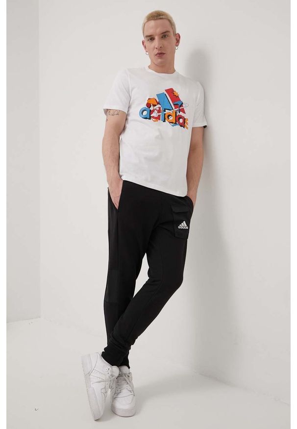 Adidas - adidas spodnie HE1776 męskie kolor czarny z aplikacją. Kolor: czarny. Wzór: aplikacja