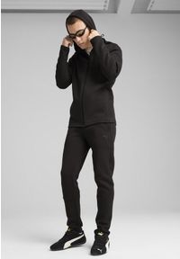 Puma - Męskie spodnie Evostripe Core PUMA Black. Kolor: czarny