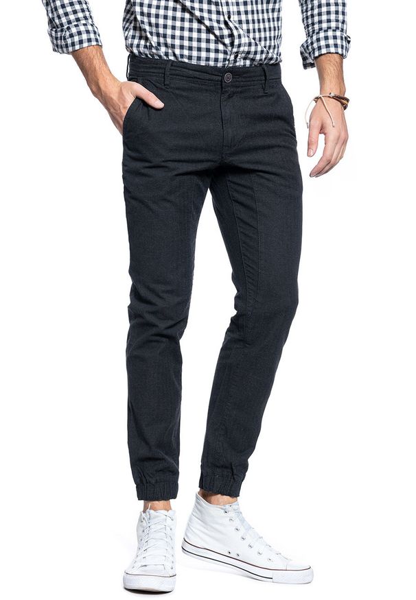 Tom Tailor - TOM TAILOR SPODNIE MĘSKIE HERRINGBONE JOGG CHINO DUSTY BLACK 6403544.00.12 COL. 2627. Stan: obniżony. Materiał: bawełna. Wzór: jodełka, jednolity. Styl: sportowy