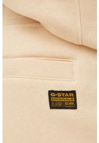 G-Star RAW - G-Star Raw spodnie dresowe kolor beżowy gładkie. Stan: podwyższony. Kolor: żółty. Materiał: dresówka. Wzór: gładki #2