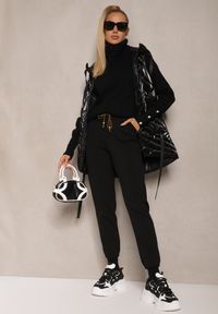 Renee - Czarne Dresowe Spodnie z Gumkami na Nogawkach i Troczkiem w Pasie Tiralee. Okazja: na co dzień. Kolor: czarny. Materiał: dresówka. Styl: elegancki, casual #4
