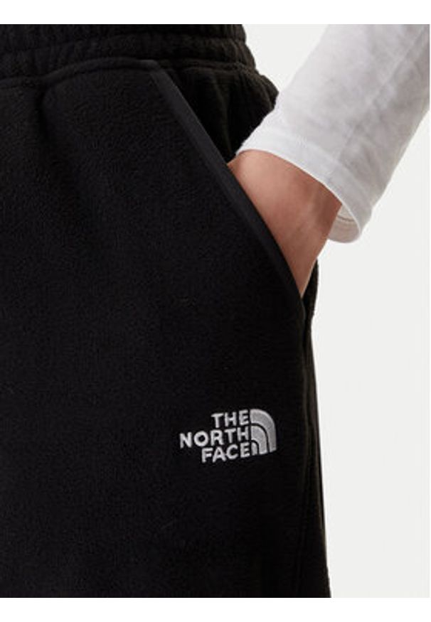 The North Face Spodnie dresowe Glacier NF0A8DQR Czarny Regular Fit. Kolor: czarny. Materiał: syntetyk