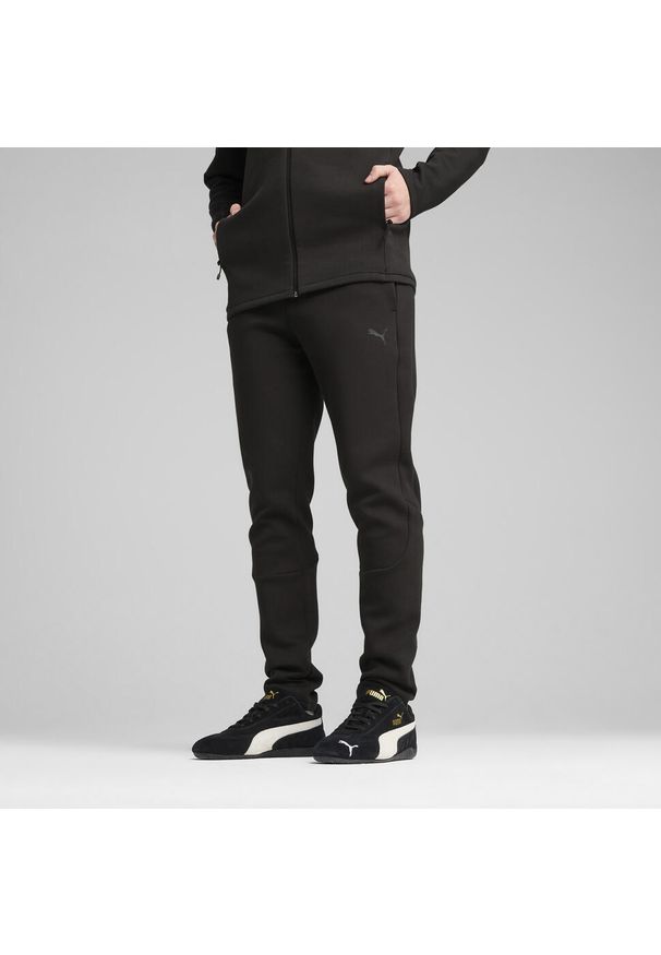 Puma - Męskie spodnie Evostripe Core PUMA Black. Kolor: czarny. Materiał: dresówka. Sport: piłka nożna