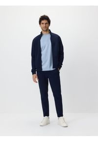 Reserved - Spodnie dresowe slim - granatowy. Kolor: niebieski. Materiał: dresówka #1