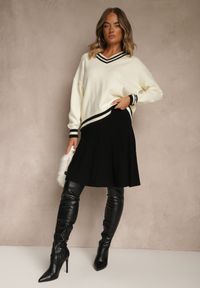 Renee - Czarna Spódnica z Kaszmirem o Rozkloszowanym Kroju High Waist Acrea. Okazja: na co dzień. Stan: podwyższony. Kolor: czarny. Materiał: kaszmir. Styl: elegancki, casual