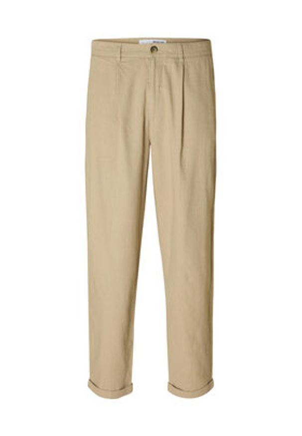 Selected Homme Chinosy 16092732 Beżowy Relaxed Fit. Kolor: beżowy. Materiał: bawełna