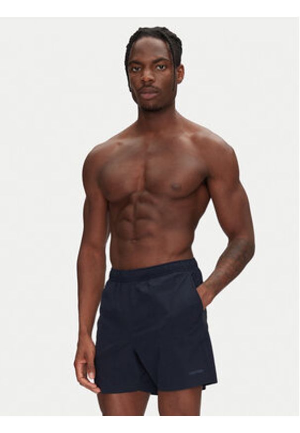 Calvin Klein Swimwear Szorty kąpielowe KM0KM01118 Granatowy Regular Fit. Kolor: niebieski. Materiał: syntetyk