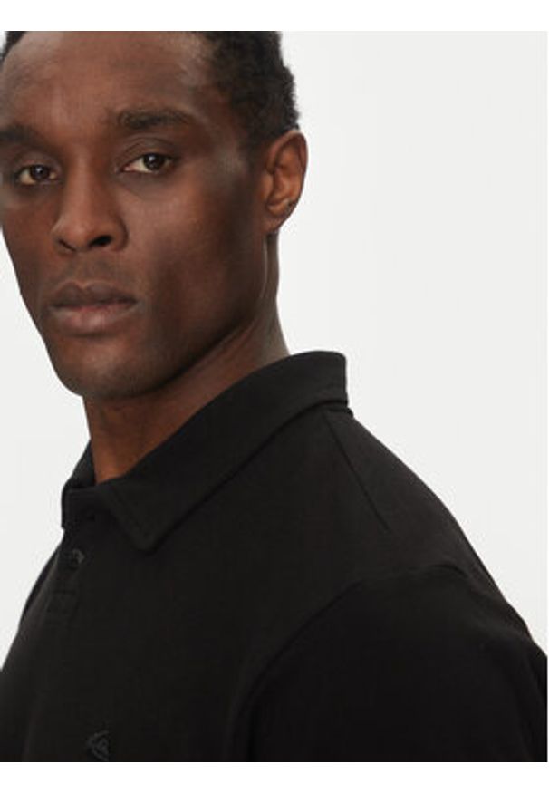 Quiksilver Polo EQYKT04375 Czarny Regular Fit. Typ kołnierza: polo. Kolor: czarny. Materiał: bawełna