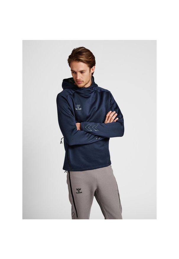 Bluza z kapturem Hummel Cima XK. Typ kołnierza: kaptur. Kolor: niebieski. Materiał: materiał. Wzór: nadruk