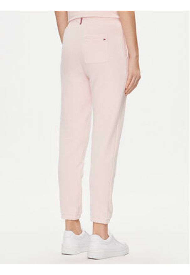 TOMMY HILFIGER - Tommy Hilfiger Spodnie dresowe 1985 WW0WW38690 Różowy Tapered Fit. Kolor: różowy. Materiał: syntetyk, bawełna
