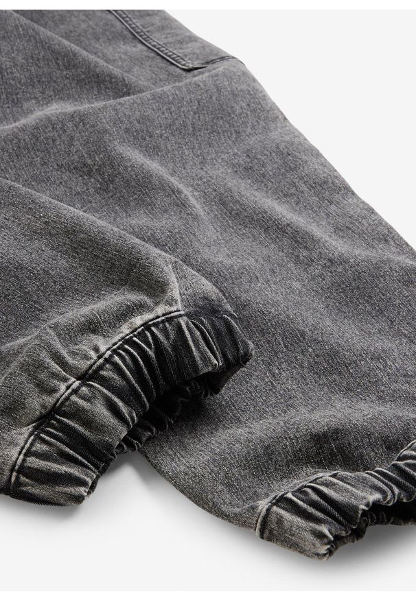 bonprix - Dżinsy bojówki o kroju loose fit z materiału z domieszką stretchu, z elastyczną gumką w pasie. Kolor: szary