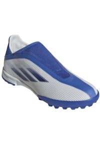 Adidas - Buty piłkarskie adidas X Speedflow.3 Ll Tf Jr GW7502 wielokolorowe białe. Kolor: wielokolorowy. Materiał: syntetyk. Szerokość cholewki: normalna. Sezon: lato. Sport: piłka nożna #3