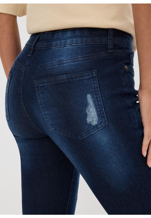 bonprix - Dżinsy SKINNY ze stretchem, mid waist. Kolor: niebieski